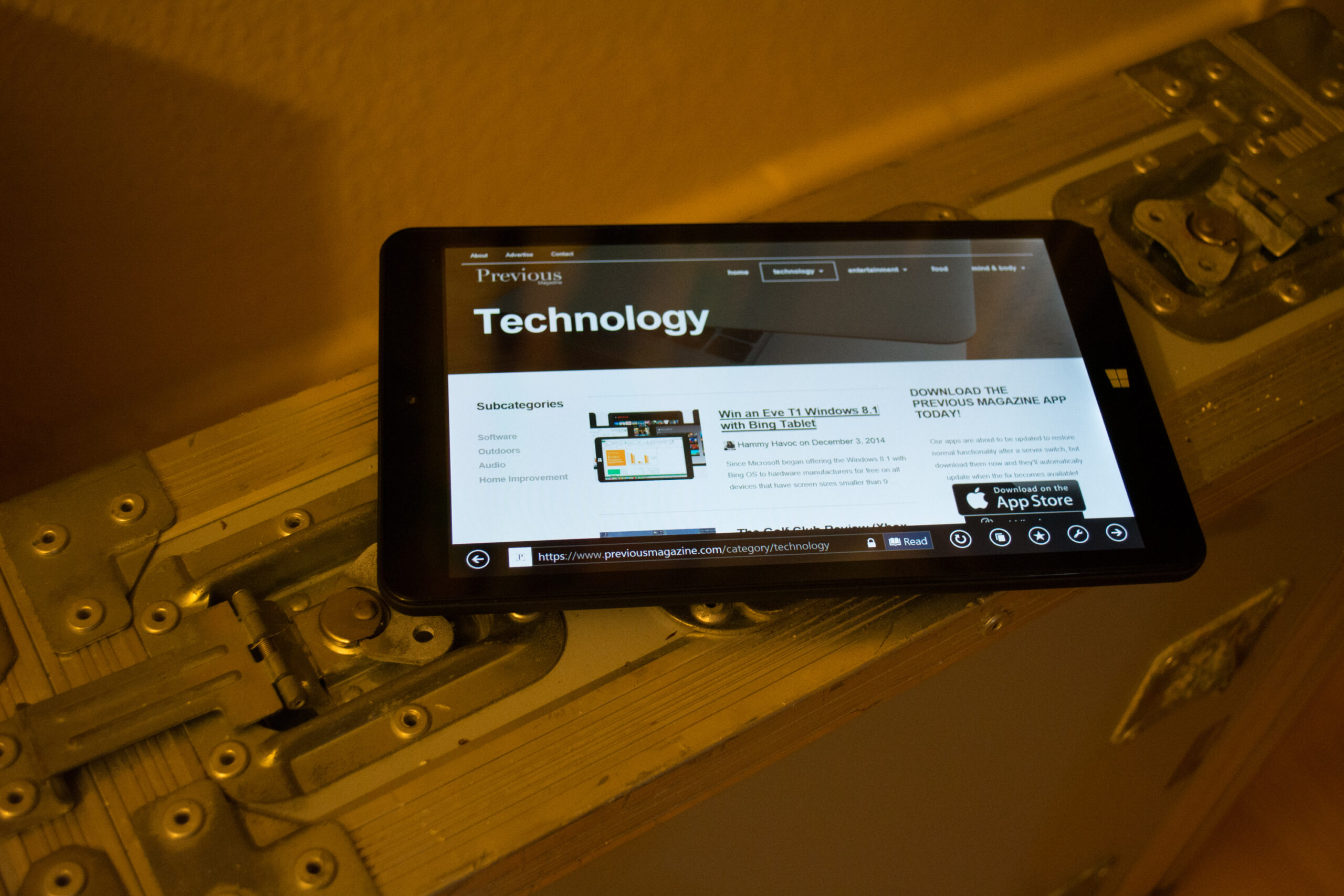 Eve T1 tablet showing the Previous Magazine website on top of flightcase