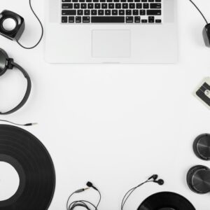 MacBook, speakers, headphones, earphones and vinyl records