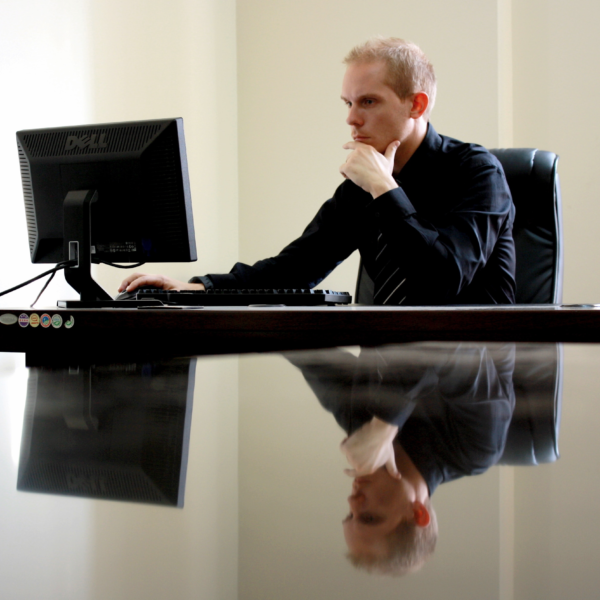 Man using computer at desk