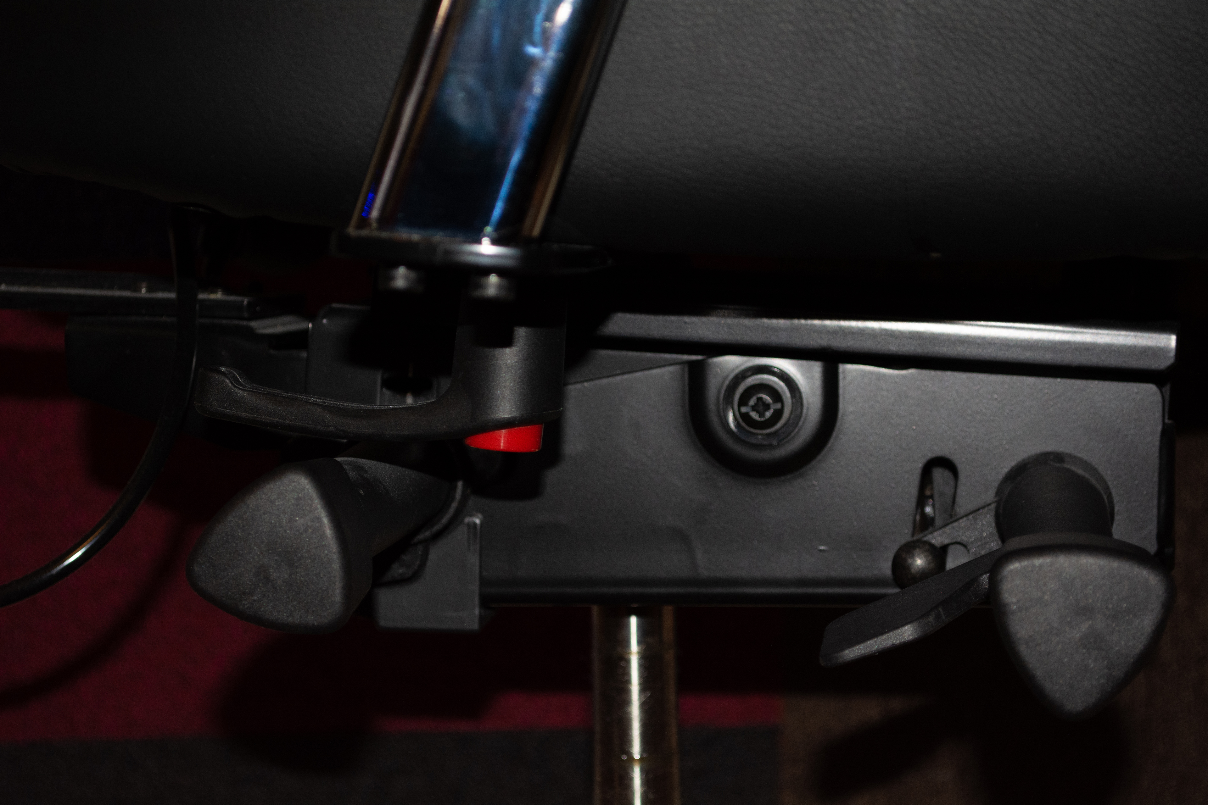 Big red shiny button on the EDGE GX1 gaming chair