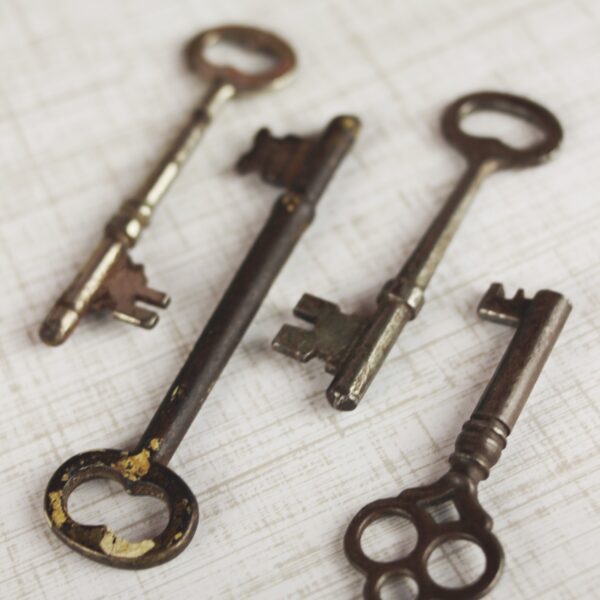 Four brass skeleton keys