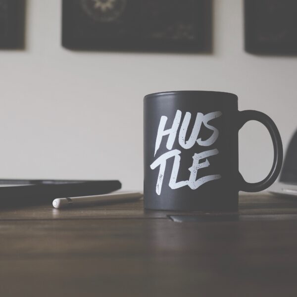 Hustle mug on table