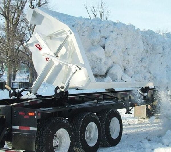 Side dump trailer with snow