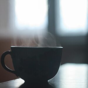 Black ceramic teacup on table