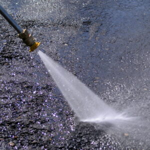 A Honda GX160 5.5 HP. pressure washer in action