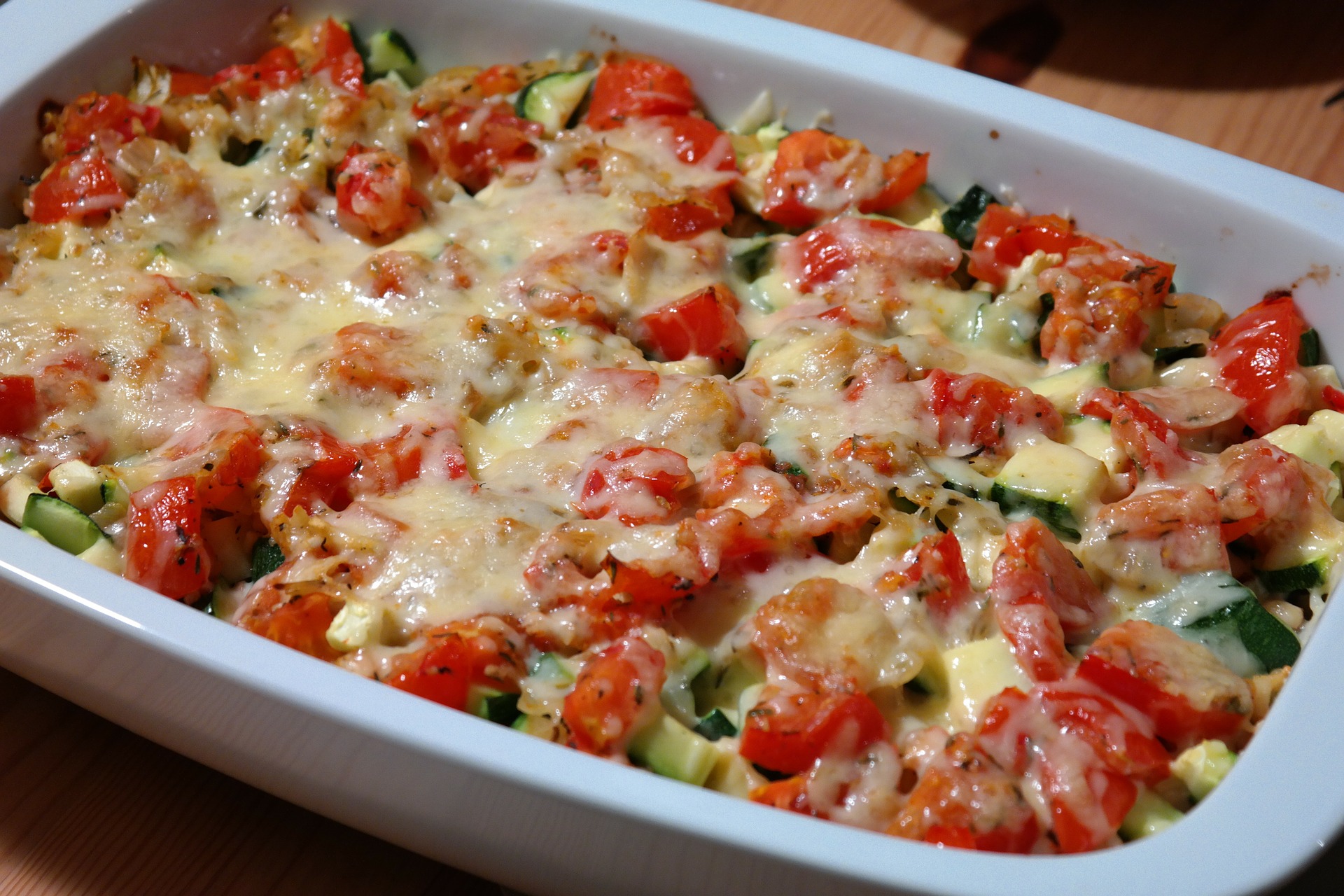 Vegetable casserole topped with cheese