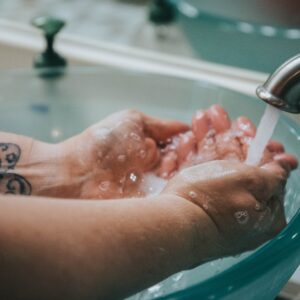 Washing hands in raised sink