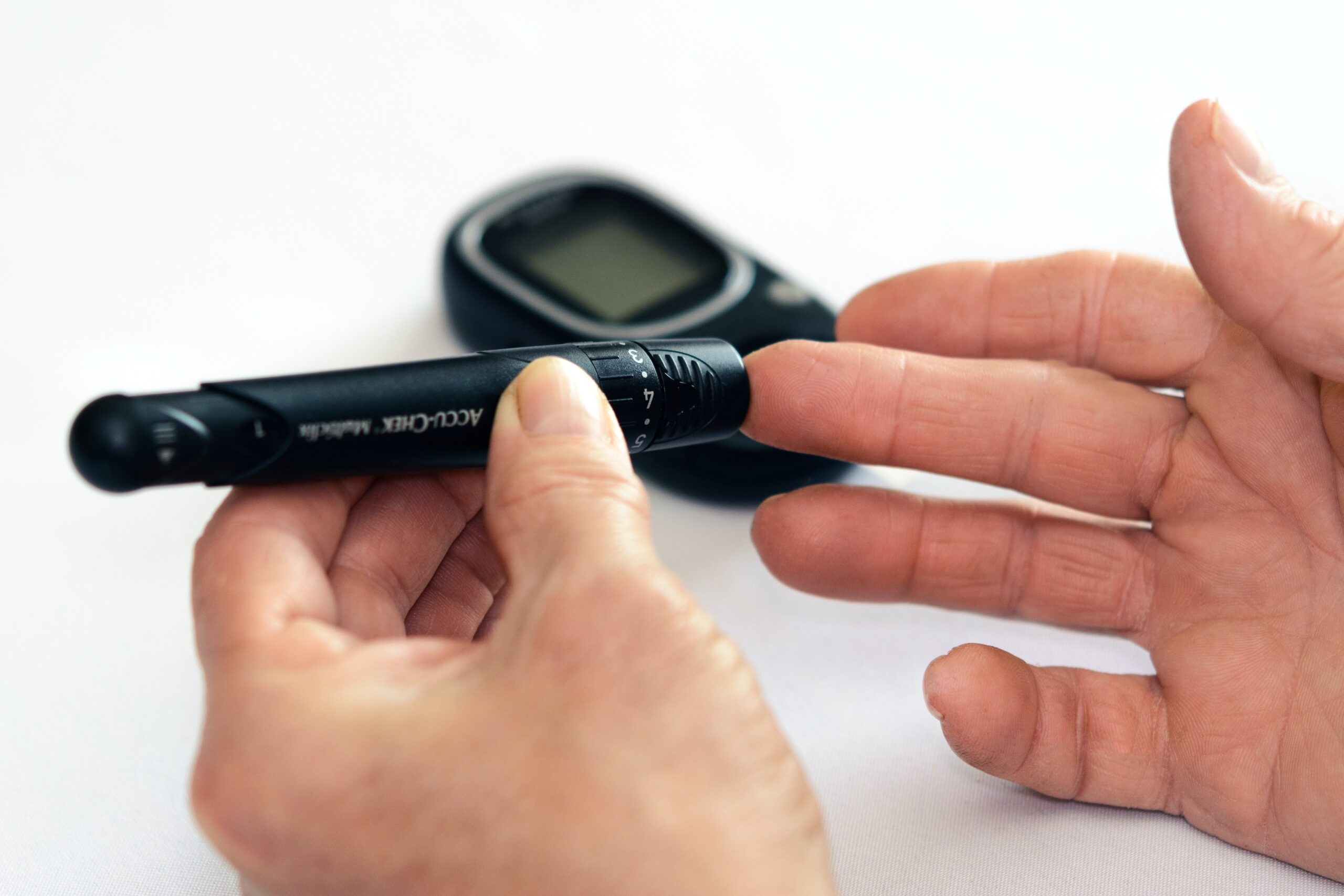 Person using a glucose meter