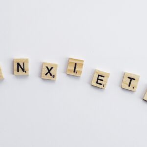 Scrabble pieces that spell out 'anxiety'