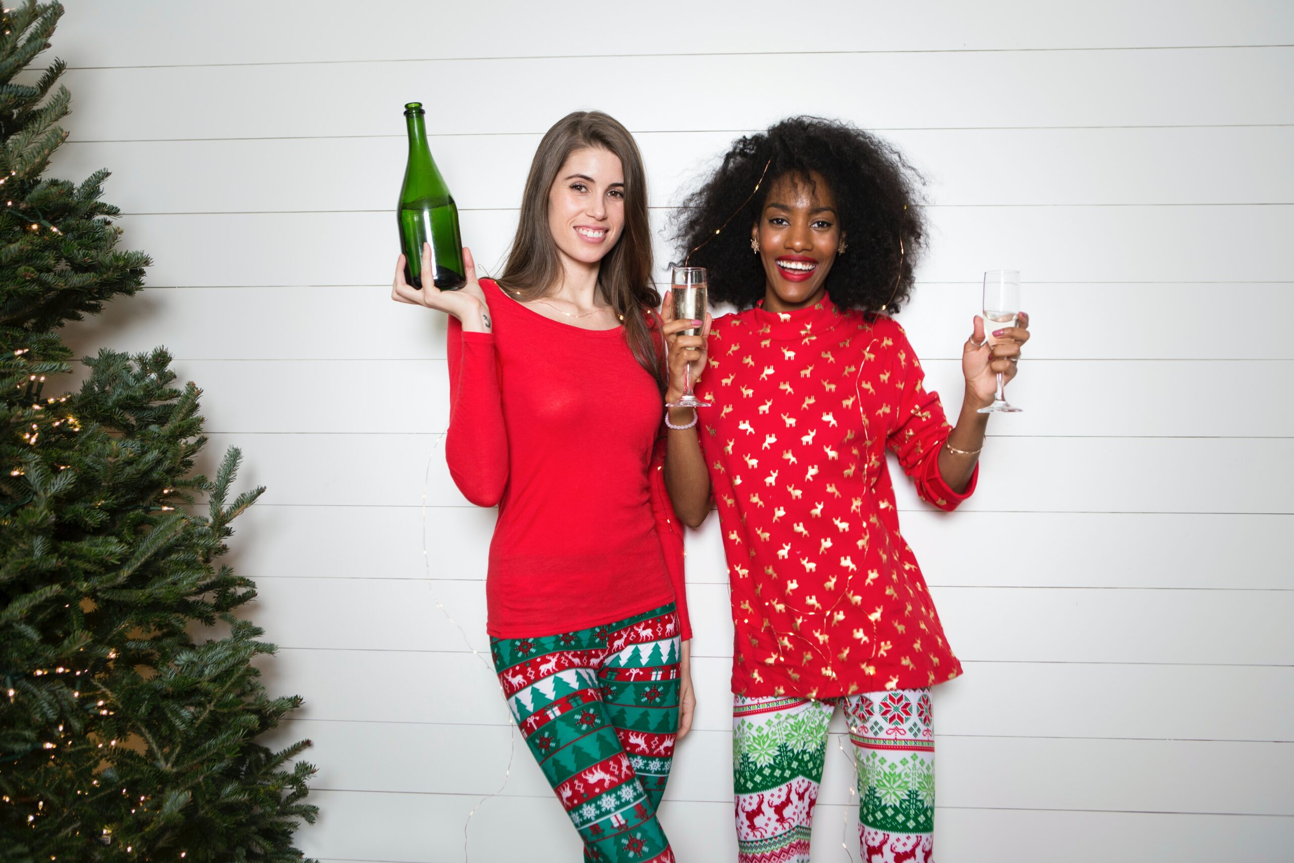 Two women dressed festively