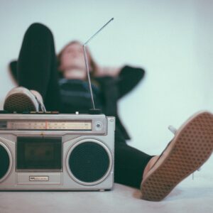 Person relaxing and listening to music