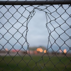Hole in chain link fence