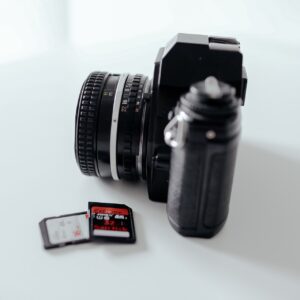 A digital camera and two SD cards