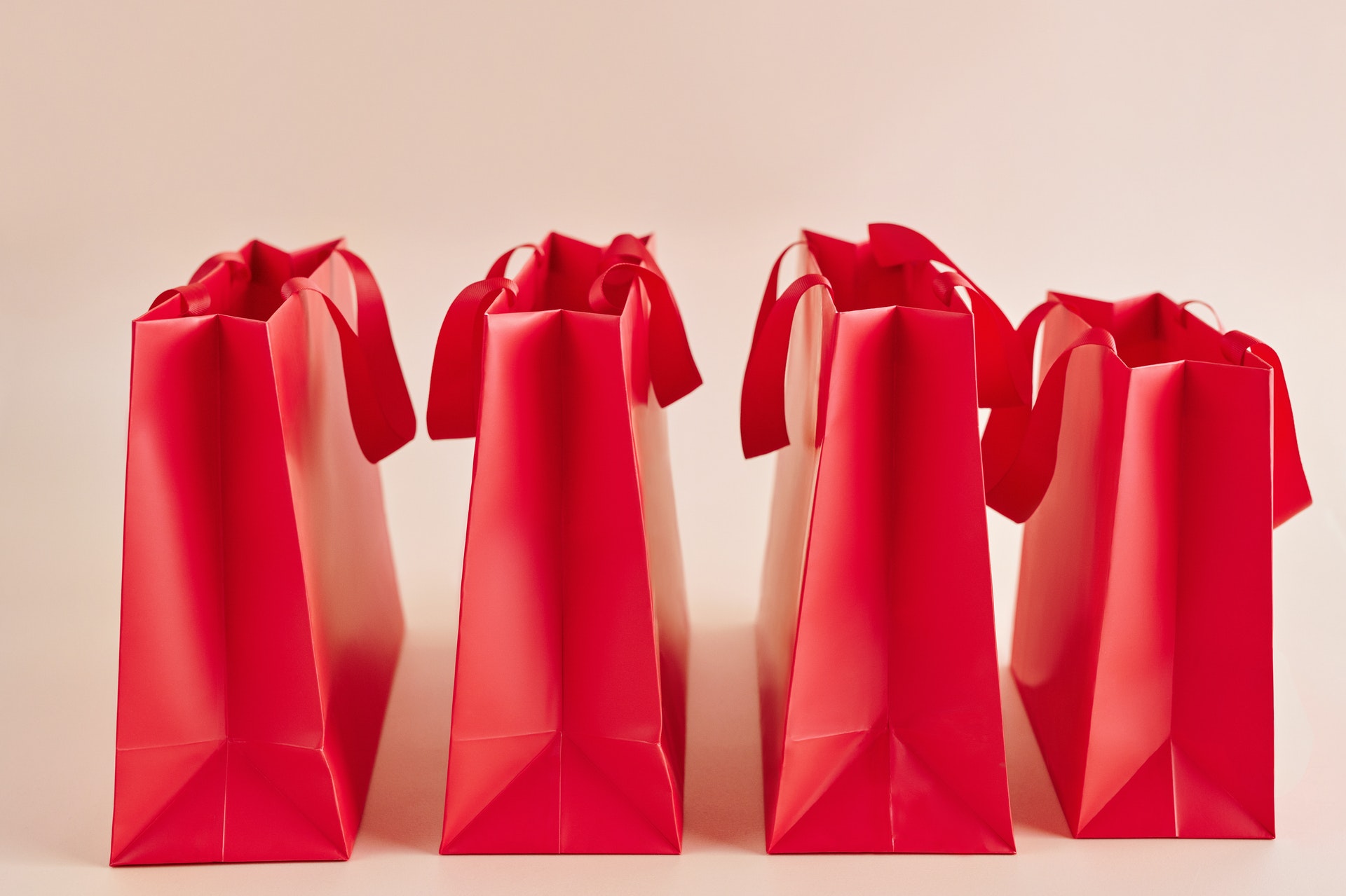 Four red gift bags
