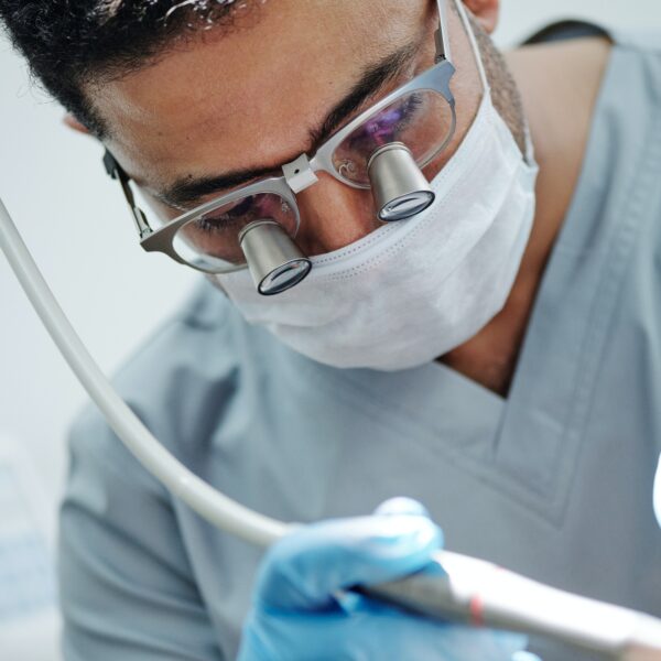 Dentist performing an oral cleaning