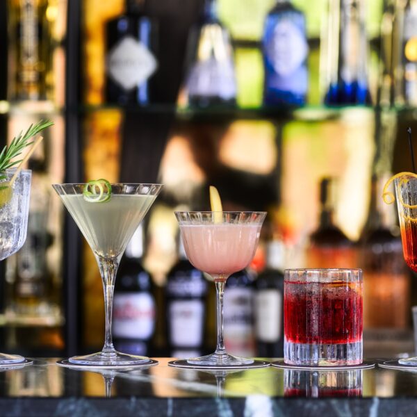 Glasses of cocktails on a bar