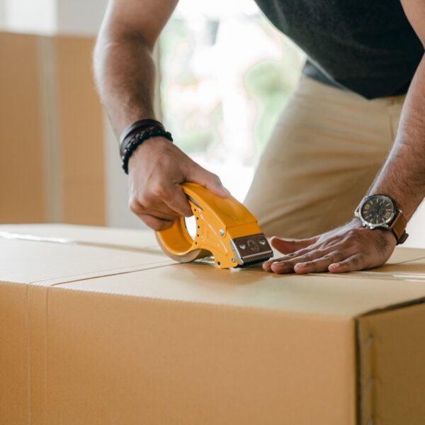 Man preparing box for shipping