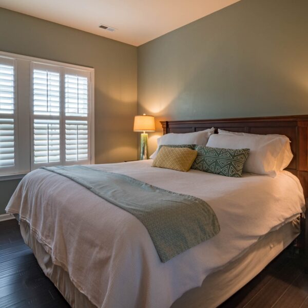 White window blinds in a bedroom