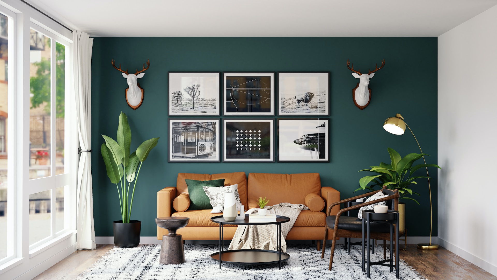 Room with a green wall, brown couch, and other decorations