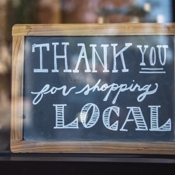 Shallow focus photo of "thank you for shopping" signage