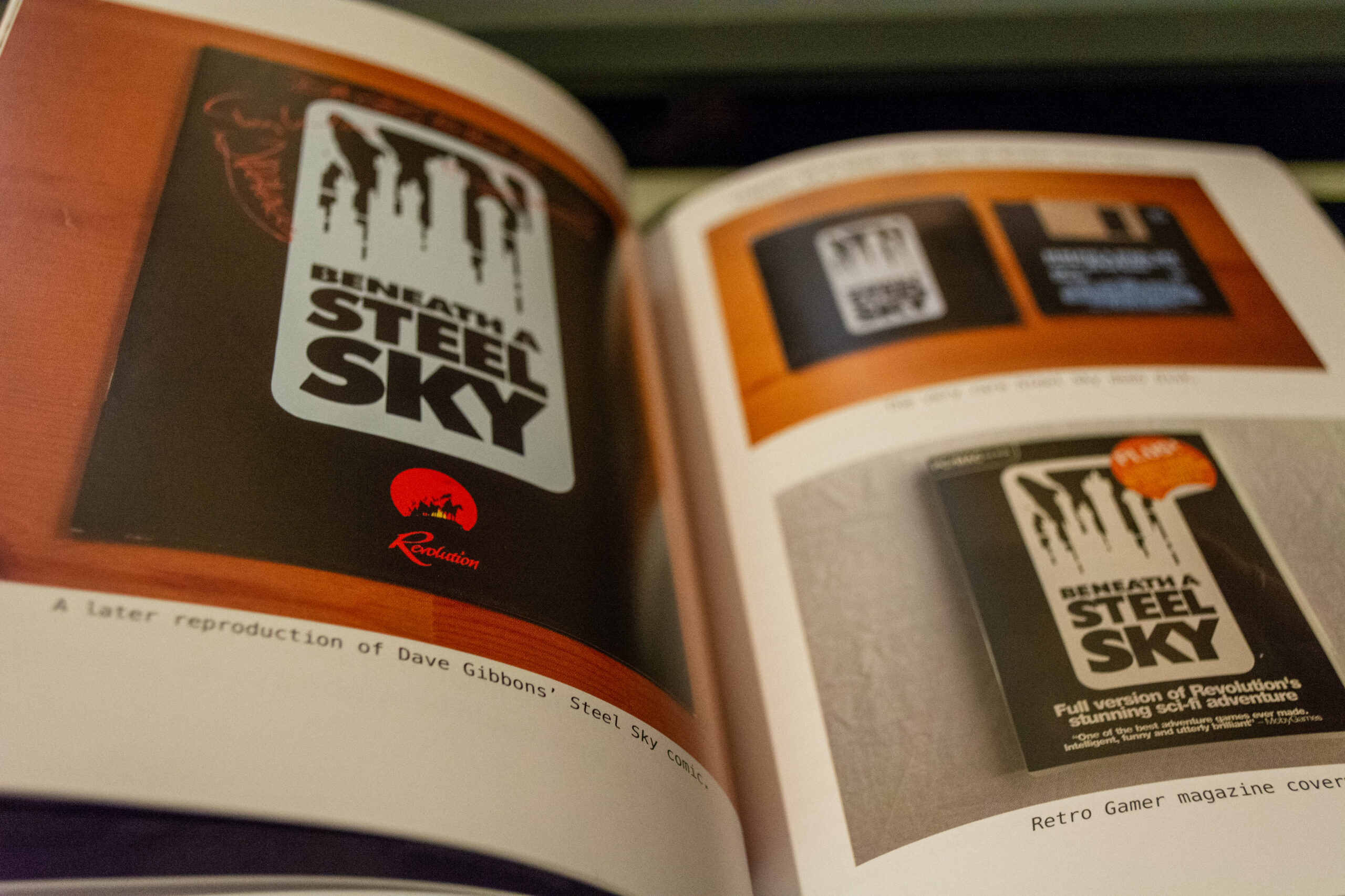 Photograph of a later reproduction of Dave Gibbons' Beneath a Steel Sky comic in Tony Warriner - Revolution: The Quest for Game Development Greatness book