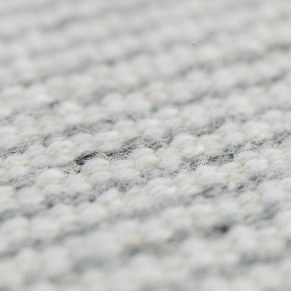 Close-up of white and grey wool textile