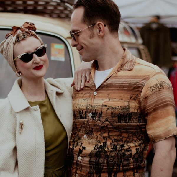 A man and a woman wearing vintage clothing
